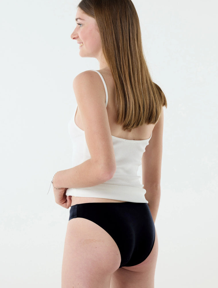 Kit primeras reglas = Braguita menstrual talla única + Bolsa + Juego educativo